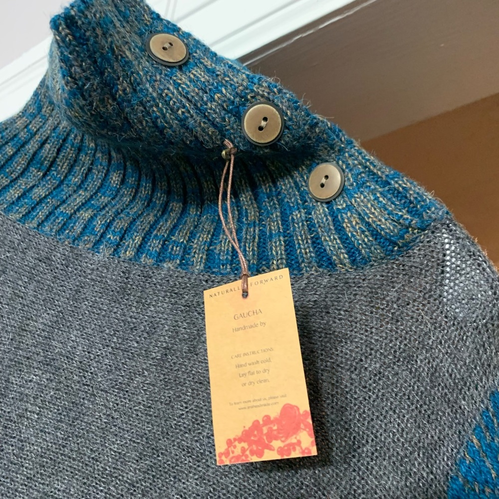 Gray, brown and blue sweater poncho.